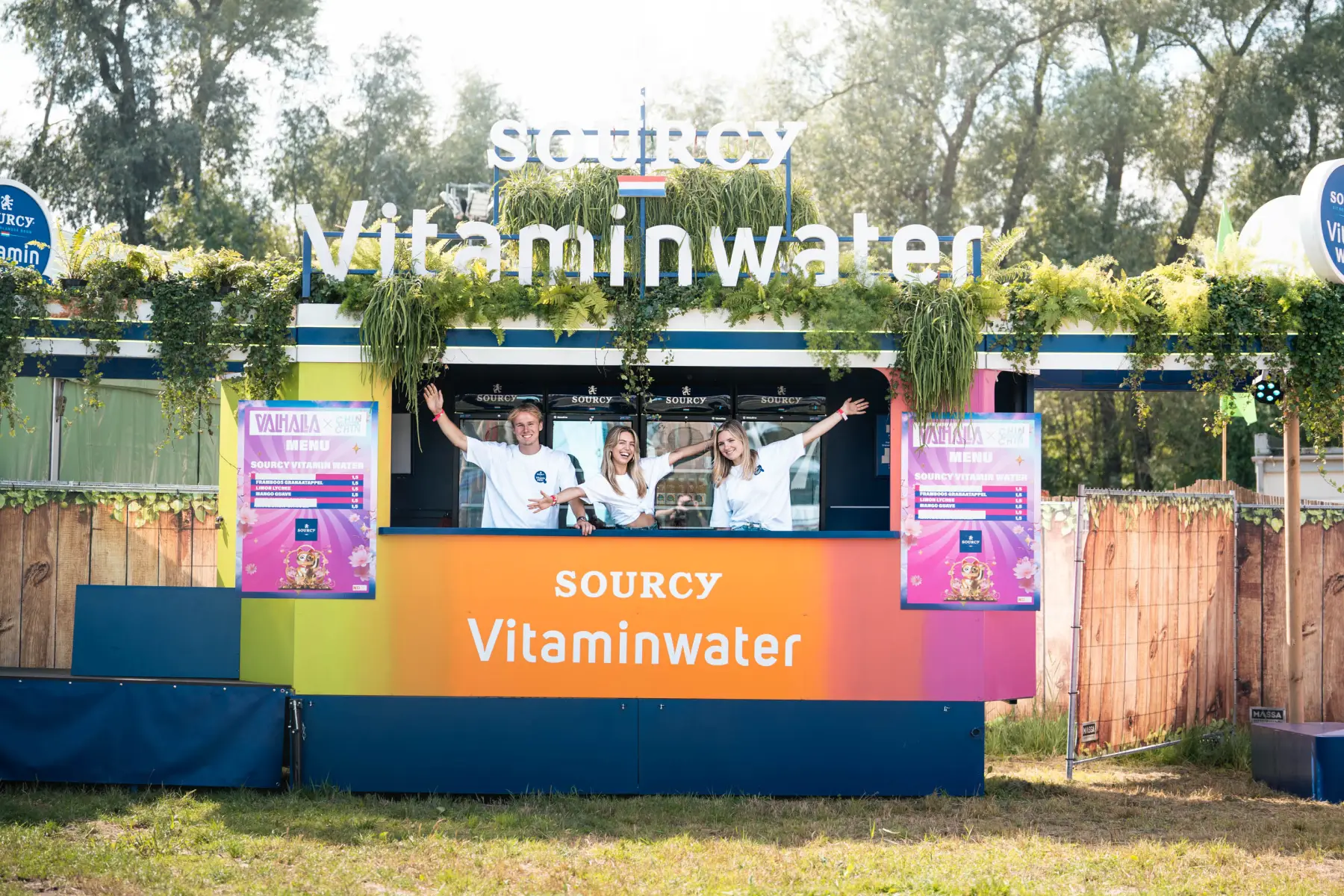Partner bar serving under the campaign signage
