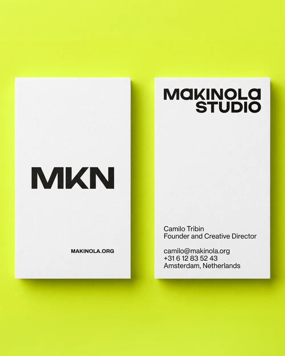 Makinola Studio business card, front and back, on lime